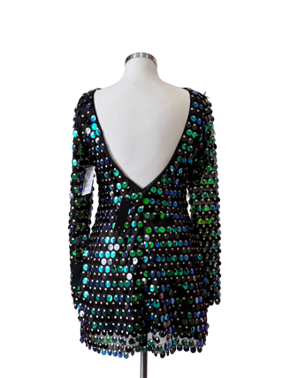 Mannequin wearing a black sequin dress with colorful beads against a plain background